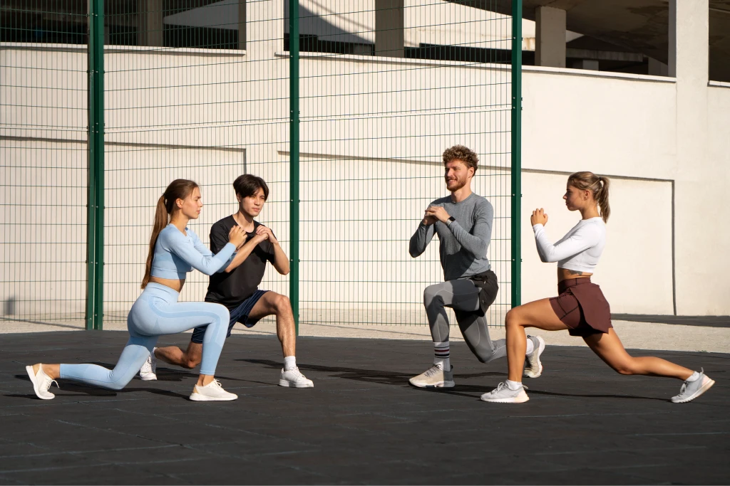 group-people-working-out-together-outdoors 1