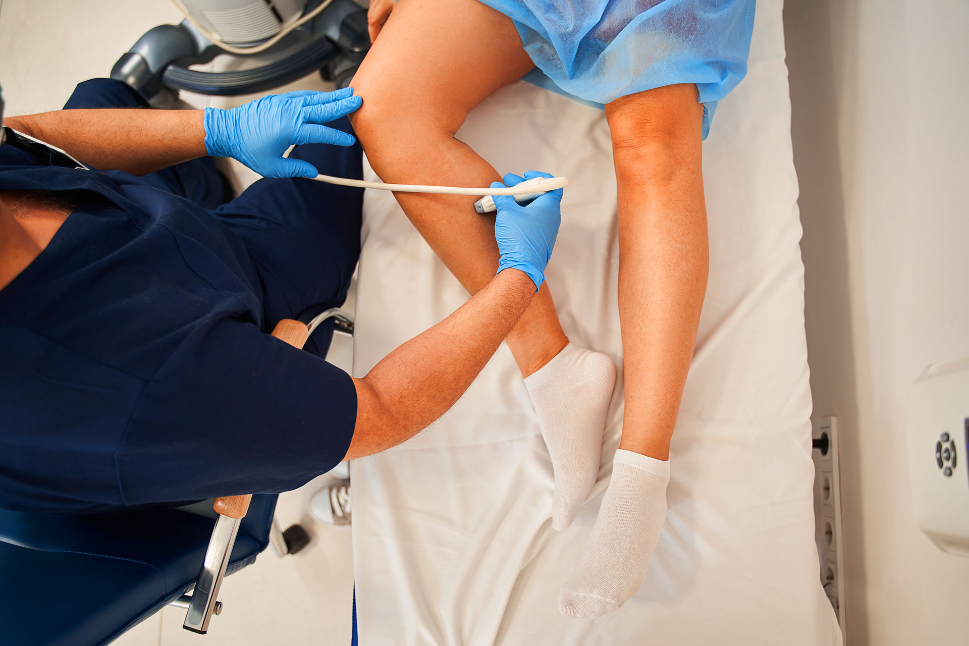 Patient receiving minimally invasive vein treatment for venous insufficiency and venous ulcers